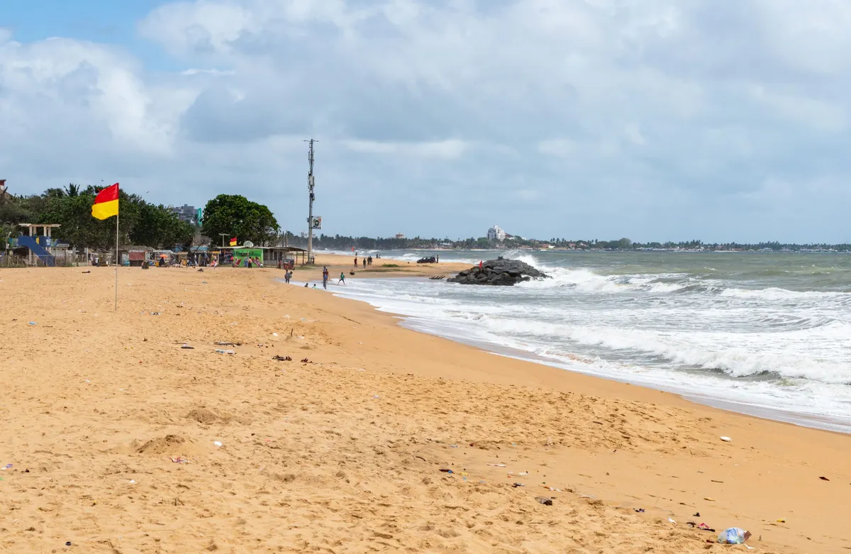 The long golden beach at Negombo, a short drive from the airport