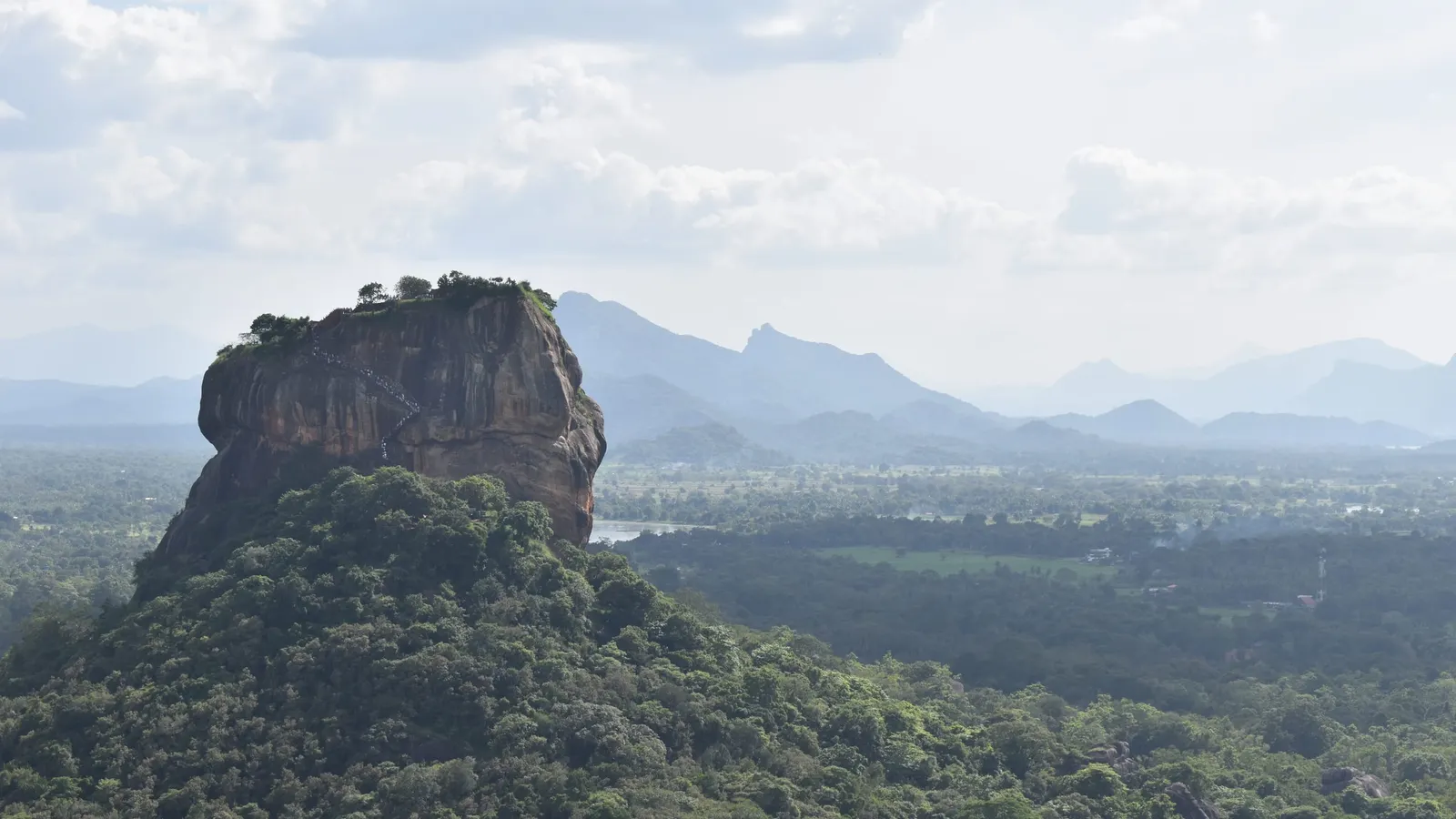 Sigiriya rock fortress rising above the jungle plains of the Cultural Triangle