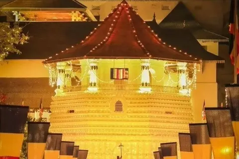 The Temple of the Sacred Tooth Relic in Kandy illuminated at night